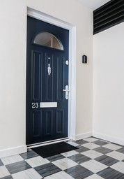 Modern residential interior with internal fire doors integrated into the design.