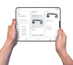 Tablet displaying the G-Smart fire door software dashboard with maintenance tracking features.