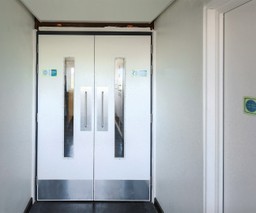 A communal double fire door set from Gerda Security installed in a residential high-rise.